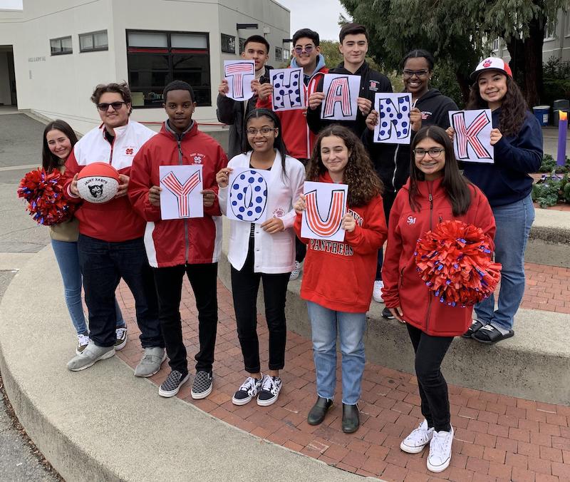 Students with Thank You Sign